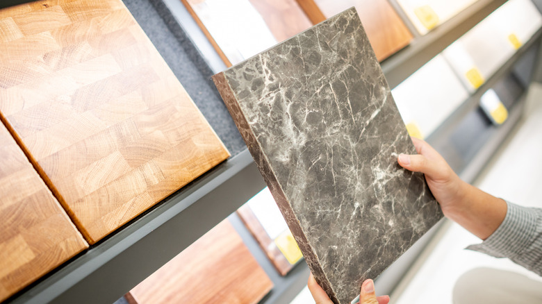 Man looking at countertop samples