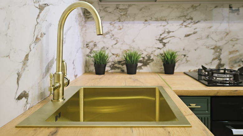 Contemporary brass kitchen sink