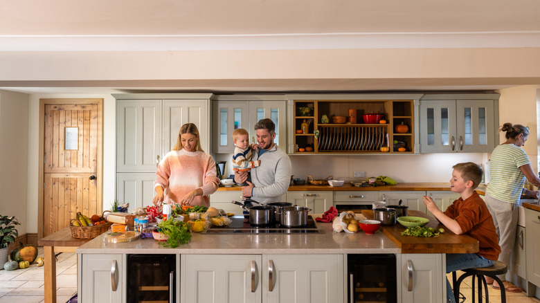 Family in the kitchen preparing for Thanksgiving