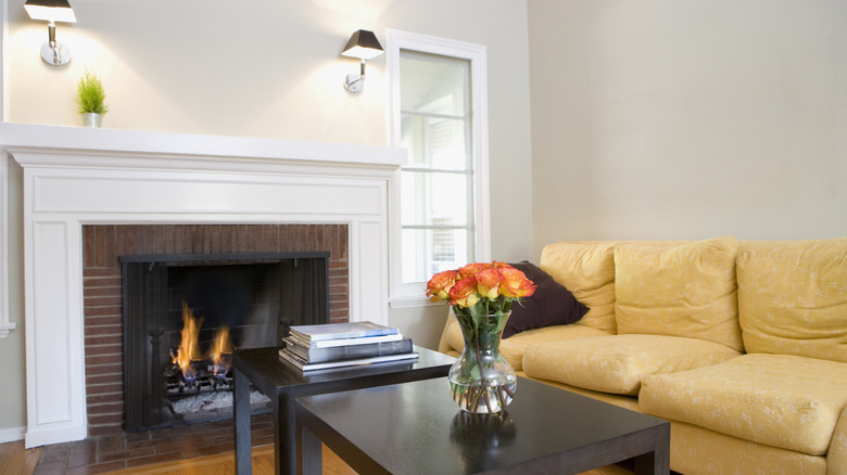 An empty fireplace mantelpiece in a living room