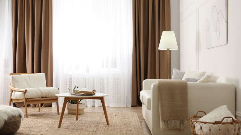 White walls and brown curtains