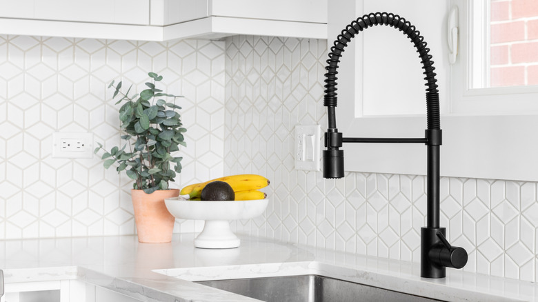 Mosaic tile backsplash in kitchen