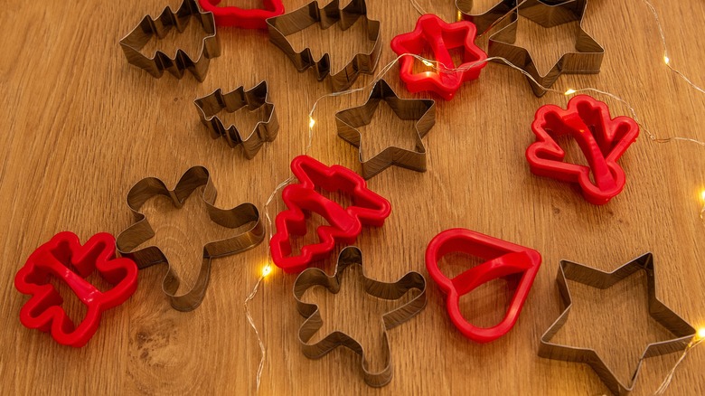 Christmas cookie cutters on table