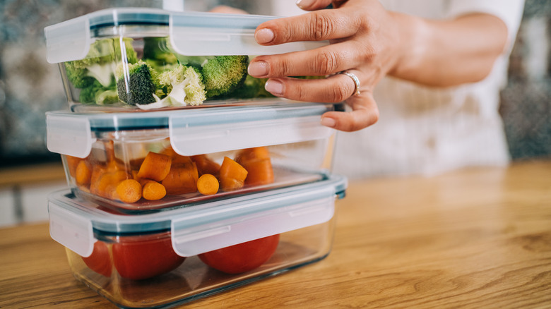 putting produce in transparent containers