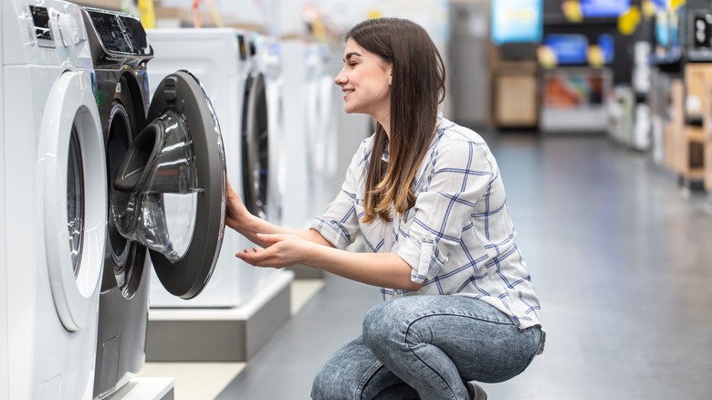 Woman shopping for new washer