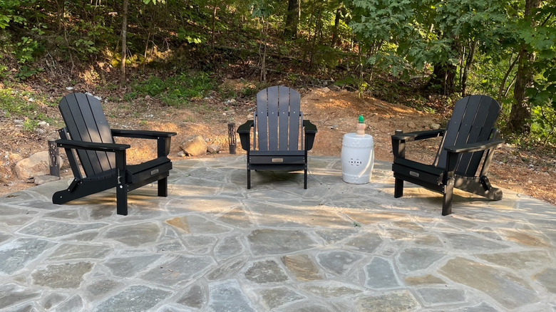 Flagstone patio layout with chairs