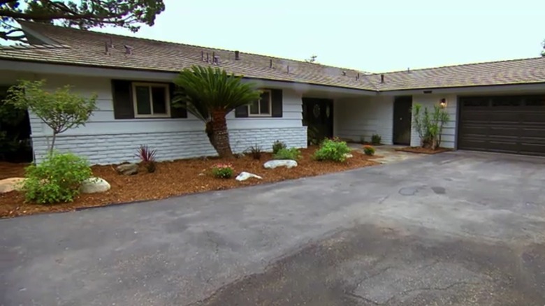 Exterior of white ranch home