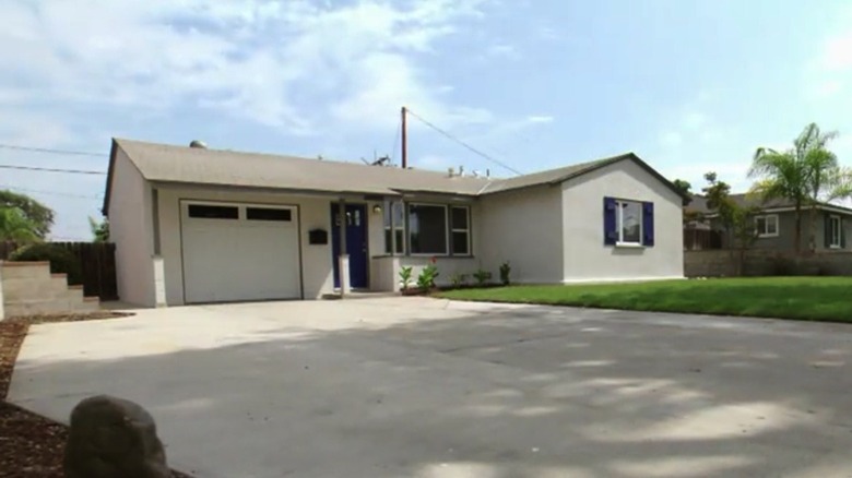 Exterior of home with long driveway