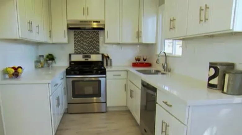 small white U-shaped kitchen 