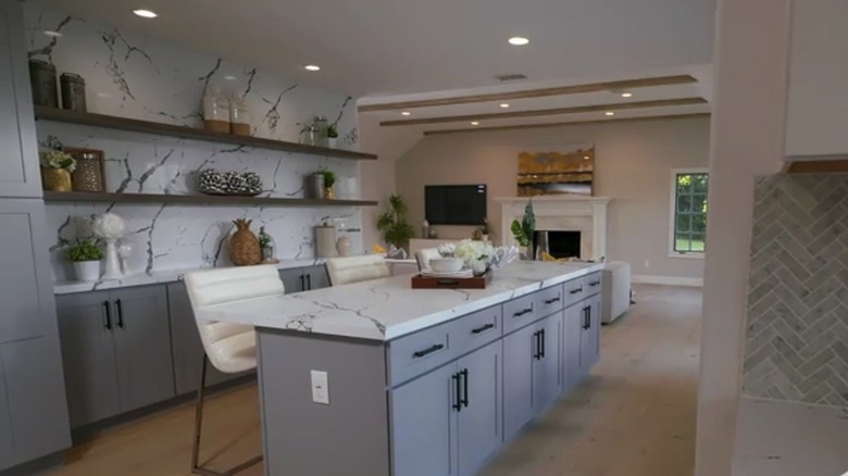white marble open floorplan kitchen
