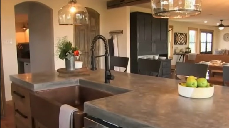 Kitchen counter, pantry, and light fixtures in Fixer Upper's Paw Paws house