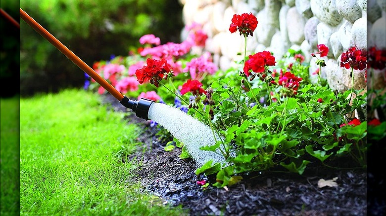 Aluminum rain wand in garden