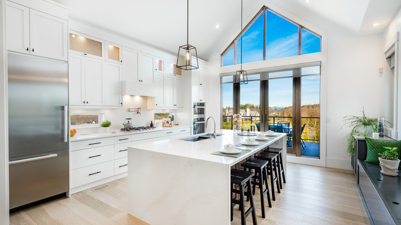 White kitchen with window wall