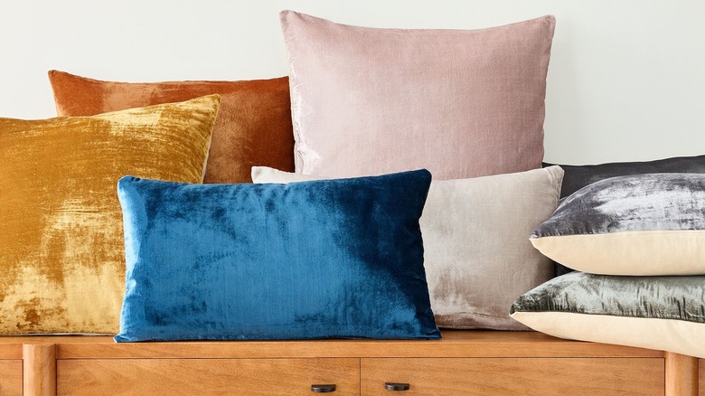 assorted velvet pillows