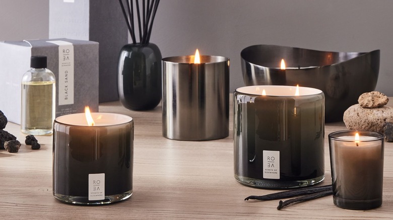 lit black glass candles