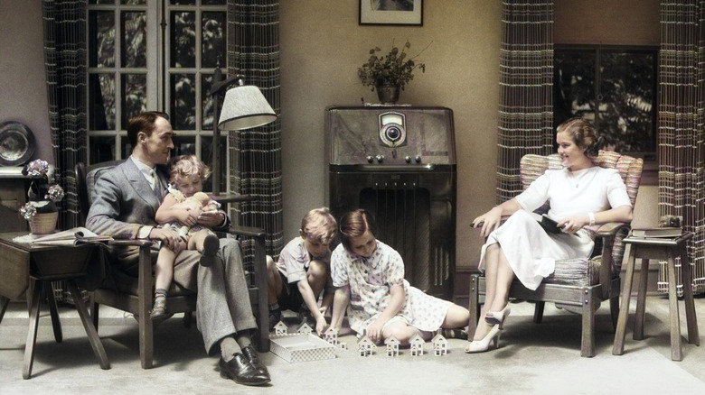 family sitting in living room