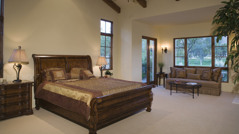 bedroom with dark wood furniture