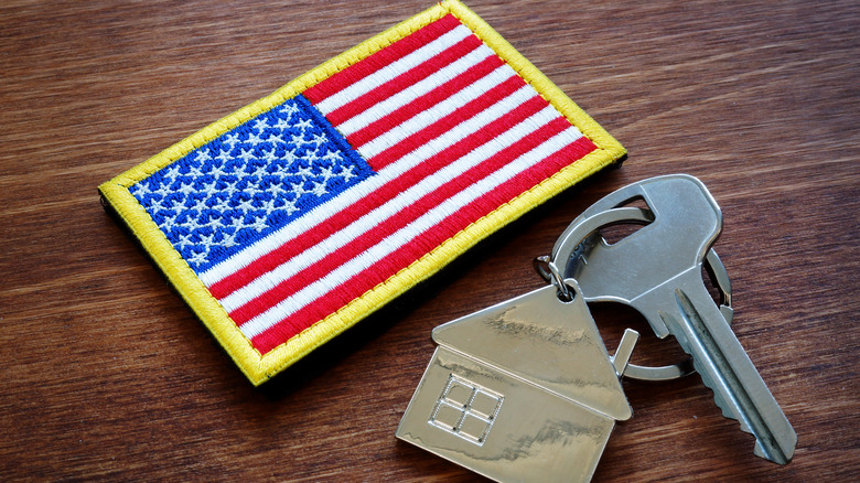 american flag and house key