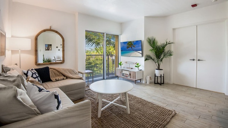 beige living room palm tree