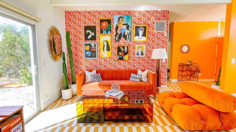 Retro room with orange couch 