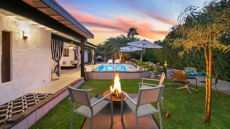 fire pit and pool at sunset