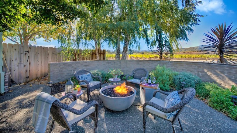 outdoor fireplace with vineyard view