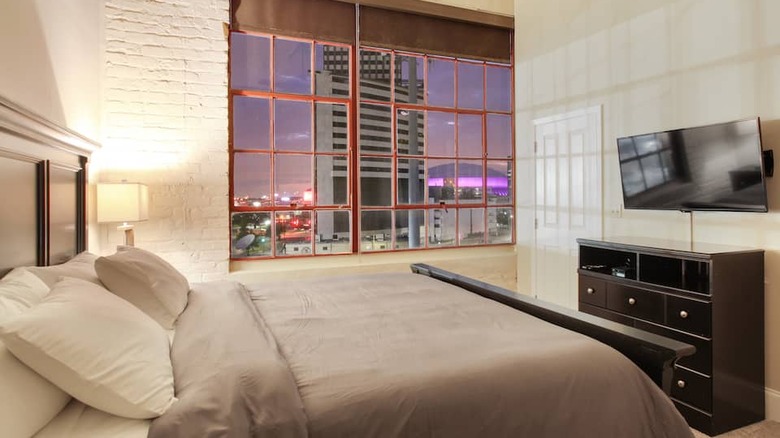 modern highrise bedroom with view