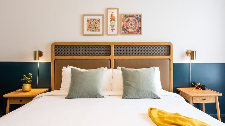 bed with brown headboard 