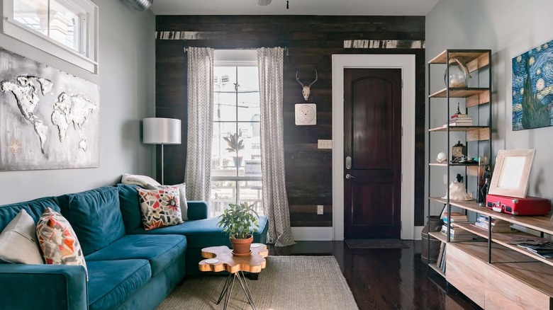 living room with blue couch 