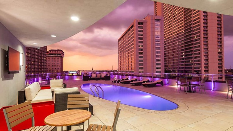 rooftop pool with neon lights 