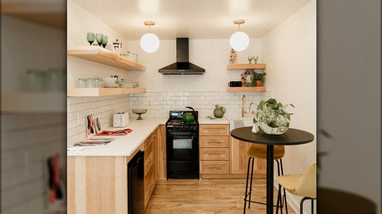 charming kitchen with white tiles