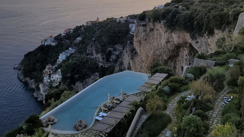 pool overlooking ocean on cliff