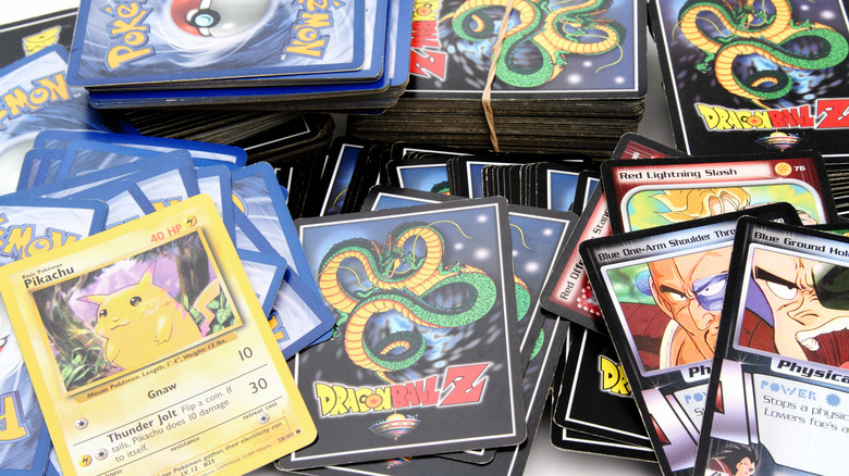 close up of pokemon and dragon ball z cards