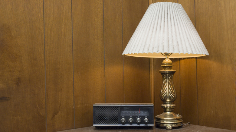 Vintage table lamp with brass base and white fluted shade