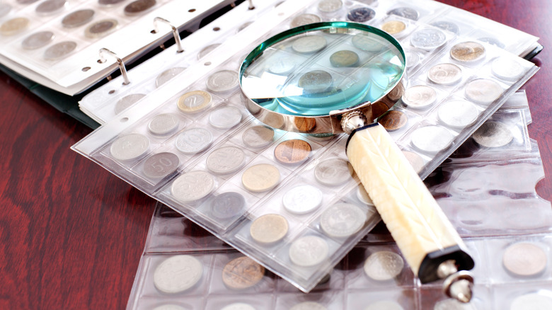 coin collection on red table