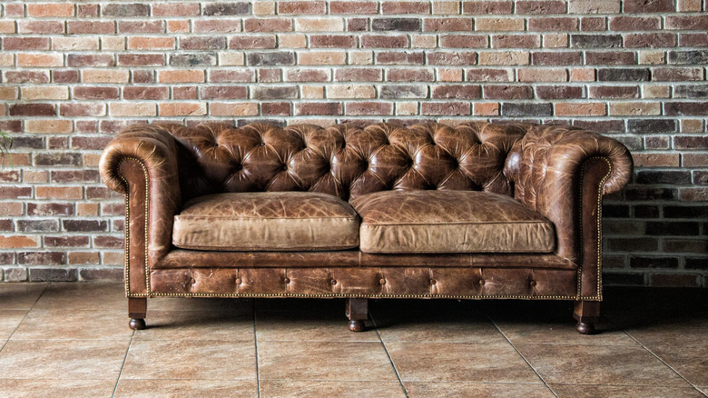 brown tufted leather couch