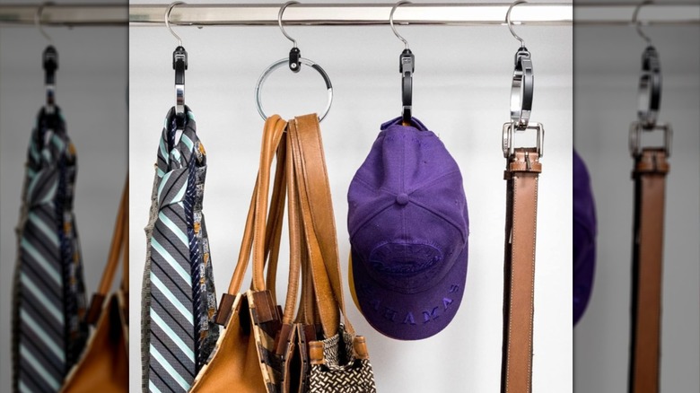 Baseball caps hanging from an organizational ring