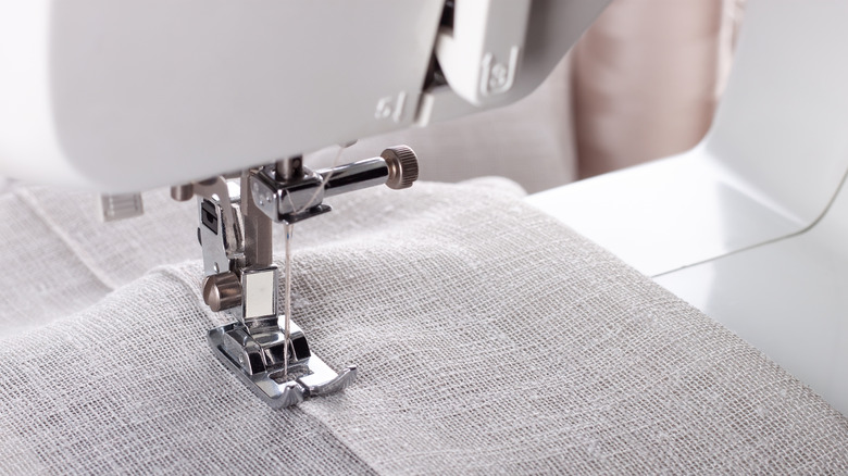 Gray fabric in a sewing machine