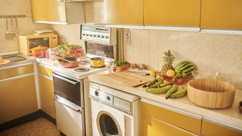 A retro 70s-inspired kitchen with vintage appliances