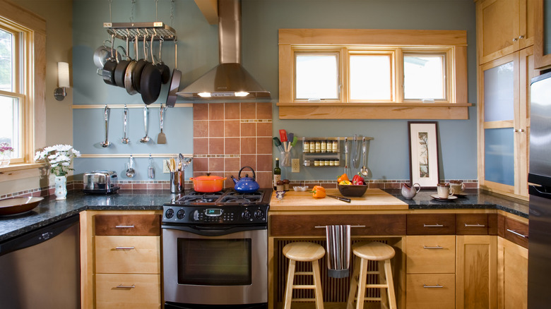 Kitchen stove with terracotta tile backsplash