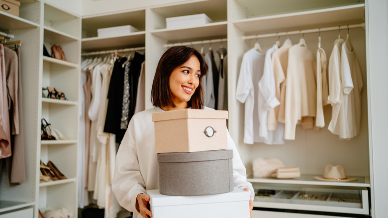 woman standing in her closet