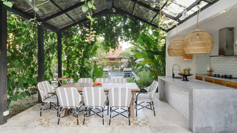 outdoor kitchen and dining area