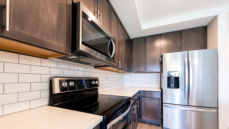 kitchen with dark brown cabinets