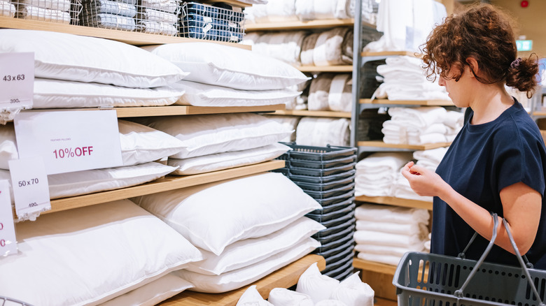 Woman shopping for bedding