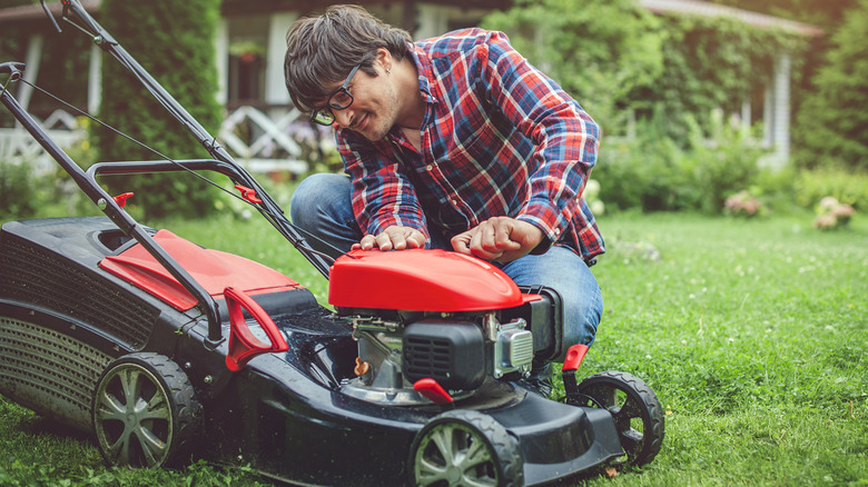 man operating his lawn mower