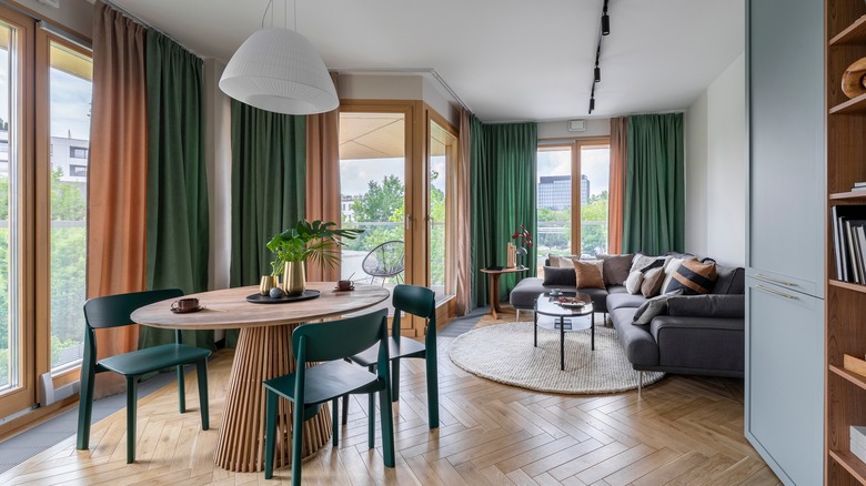 Earth-toned living area with drapes