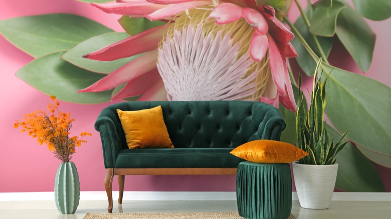 Pink and green room with mural