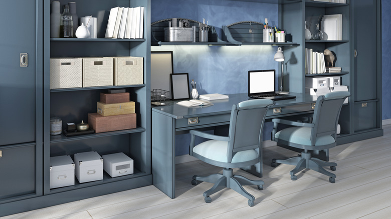 Blue shelving in office