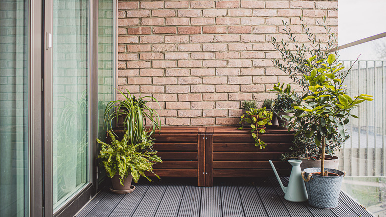 small patio with wooden bench