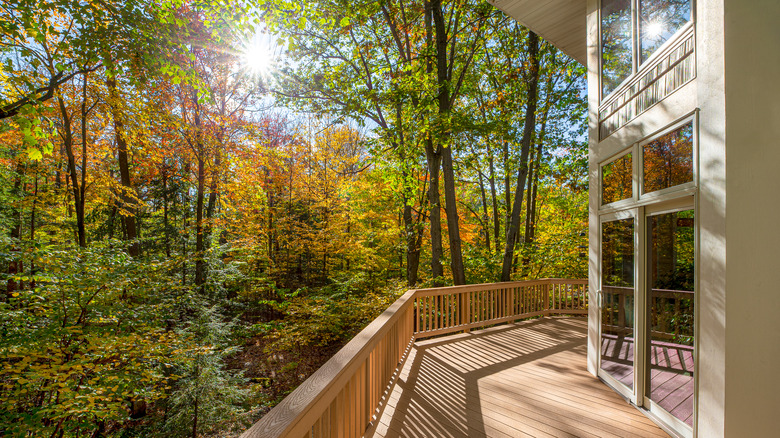 white home with beige deck paint